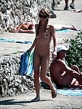 Nudist teen not shy about posing nude at the beach